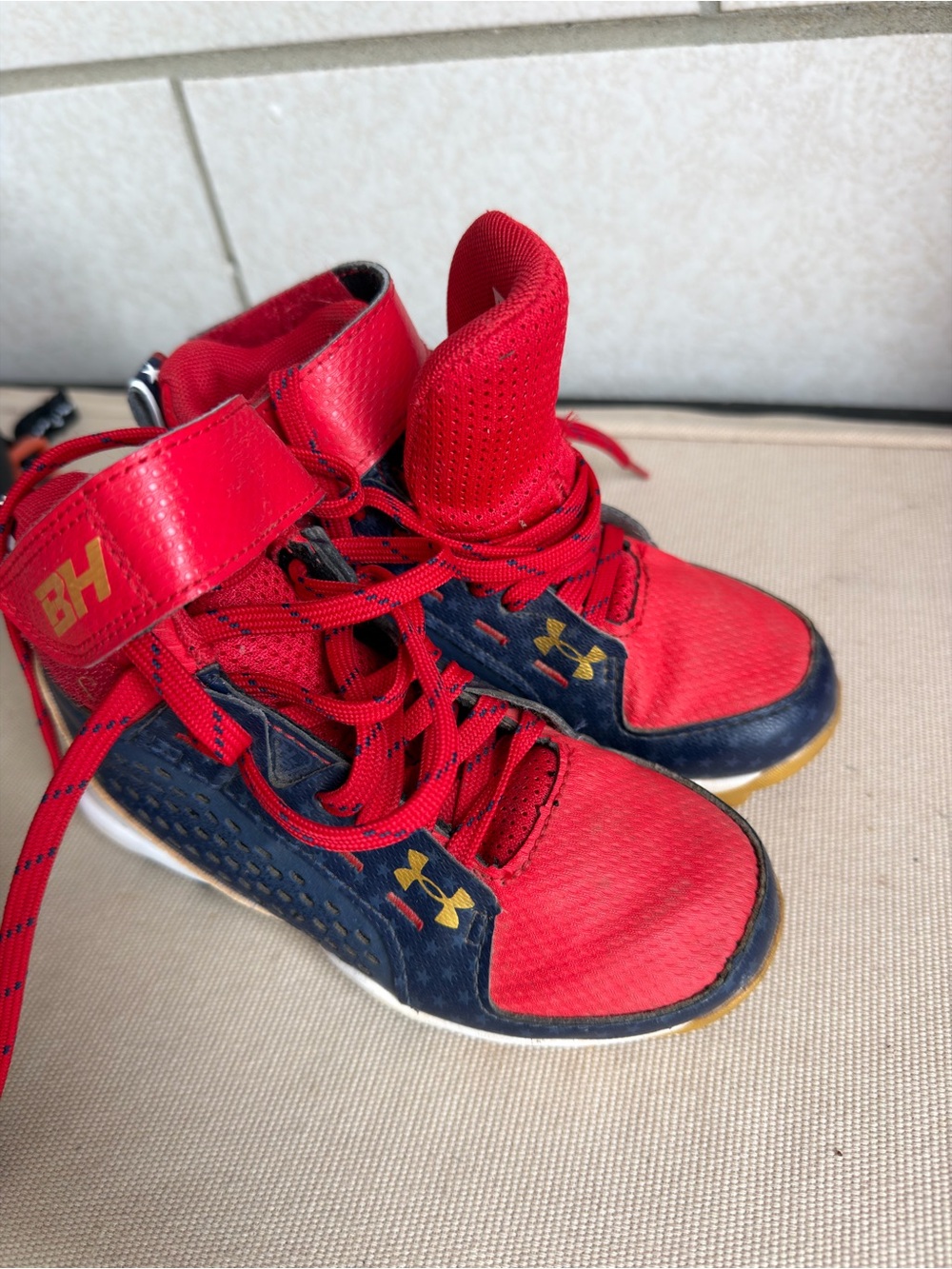 Under Armour Kids' High-Top Cleats in Red and Navy